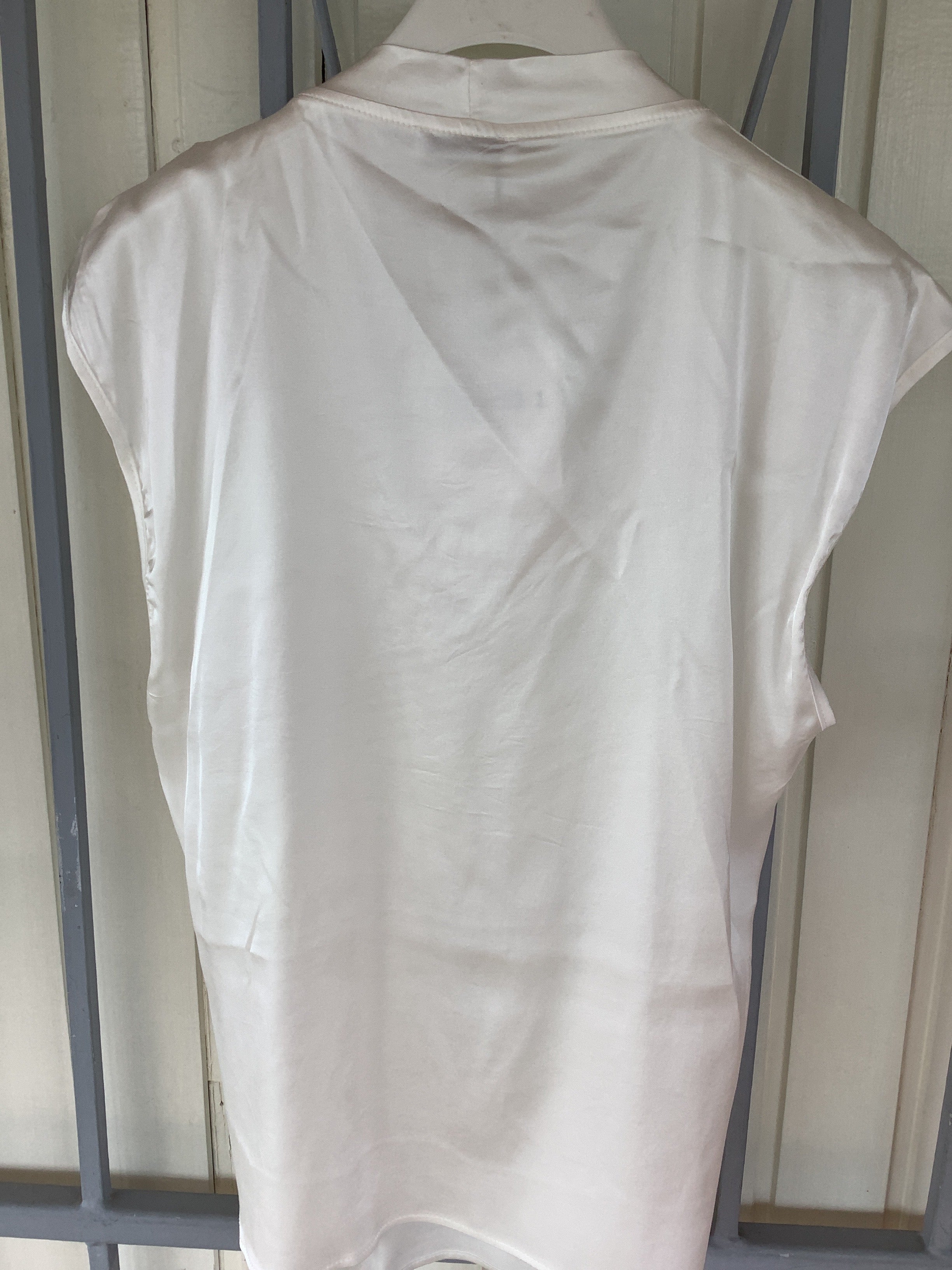 Satin blouse.