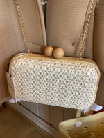 Load image into Gallery viewer, Woven raffia clutch bag.
