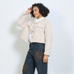 Load image into Gallery viewer, Cropped textured jacket with decorative buttons and flap pockets
