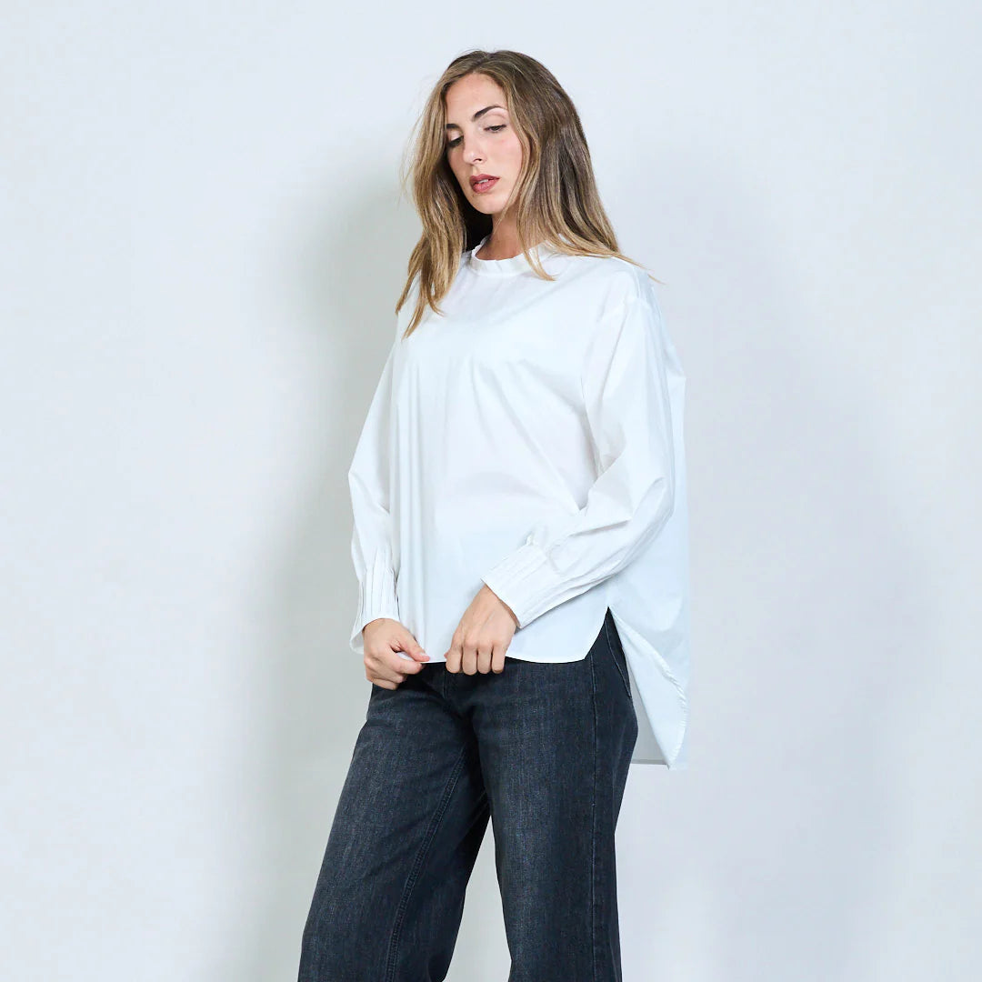 Asymmetric blouse.
