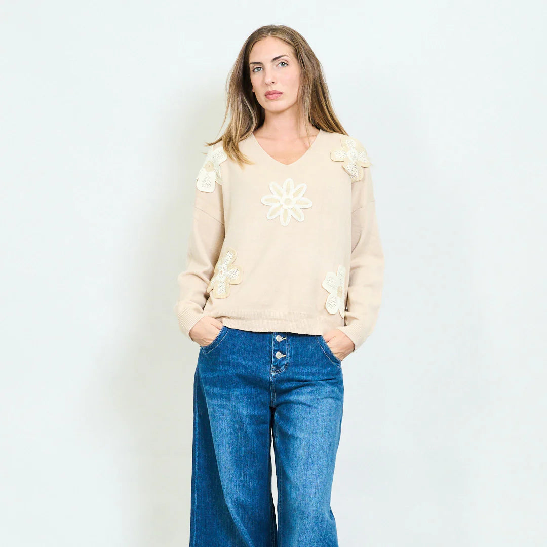 Crochet floral sweater.