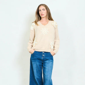 Crochet floral sweater.