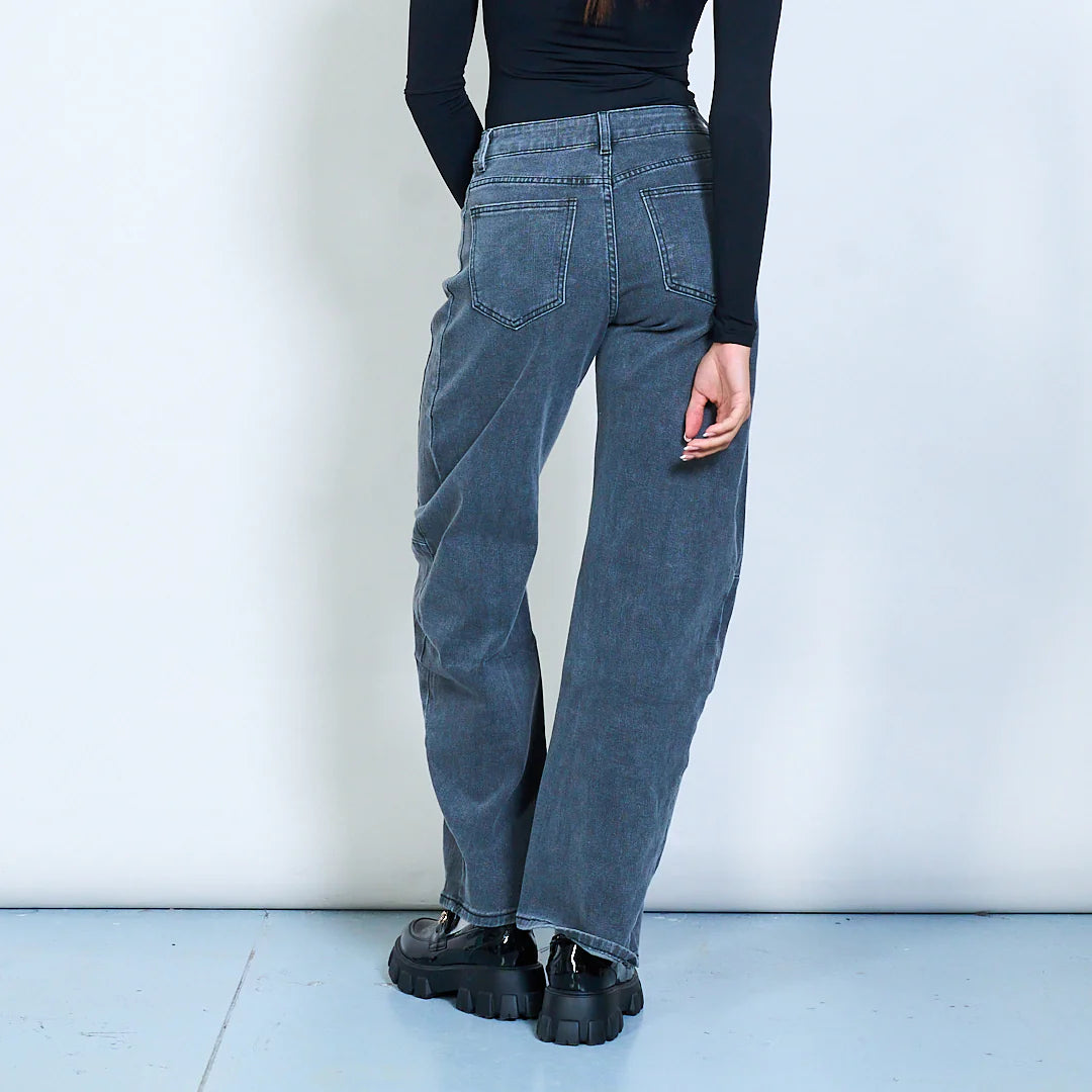 Washed blue wide-leg denim trousers with seam detail
