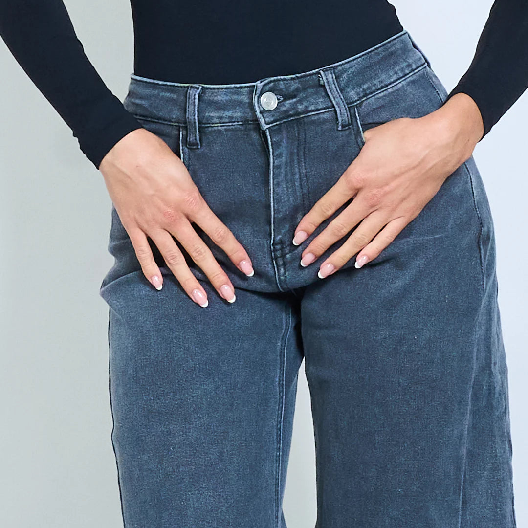 Washed blue wide-leg denim trousers with seam detail