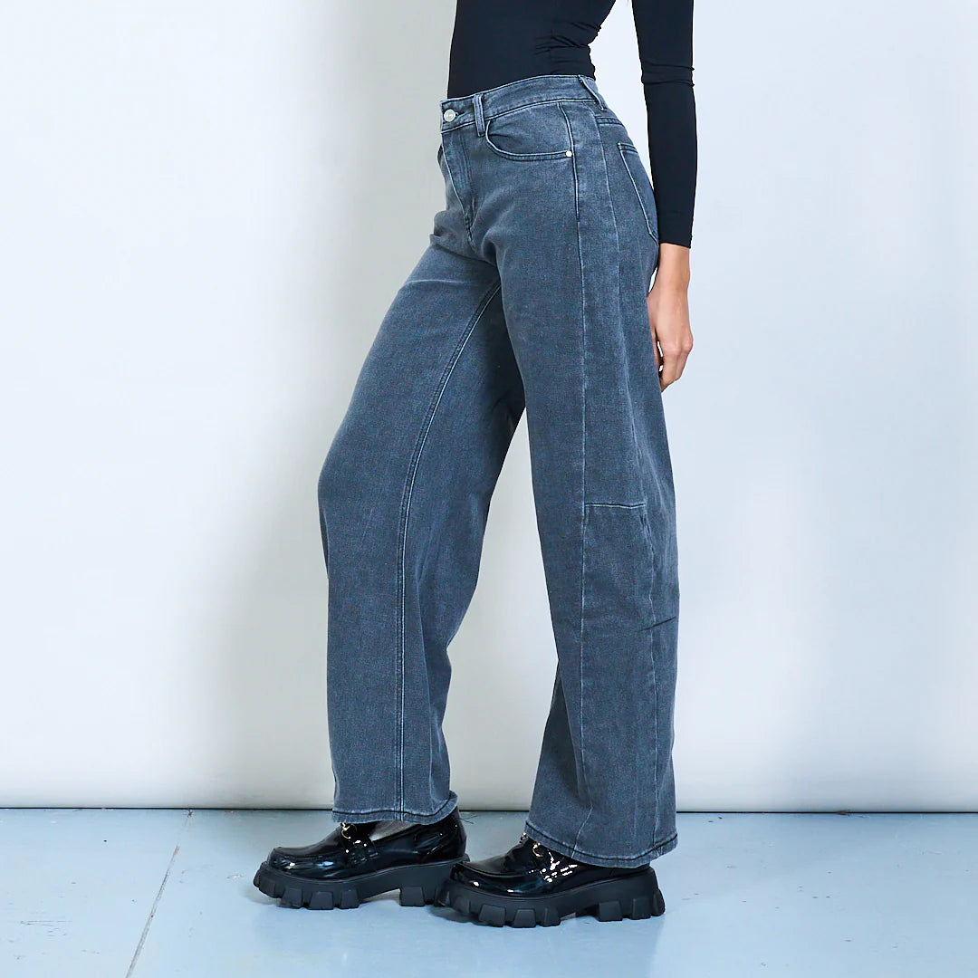 Washed blue wide-leg denim trousers with seam detail