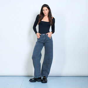 Washed blue wide-leg denim trousers with seam detail