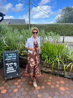 Load image into Gallery viewer, Smocked floral tiered midi dress
