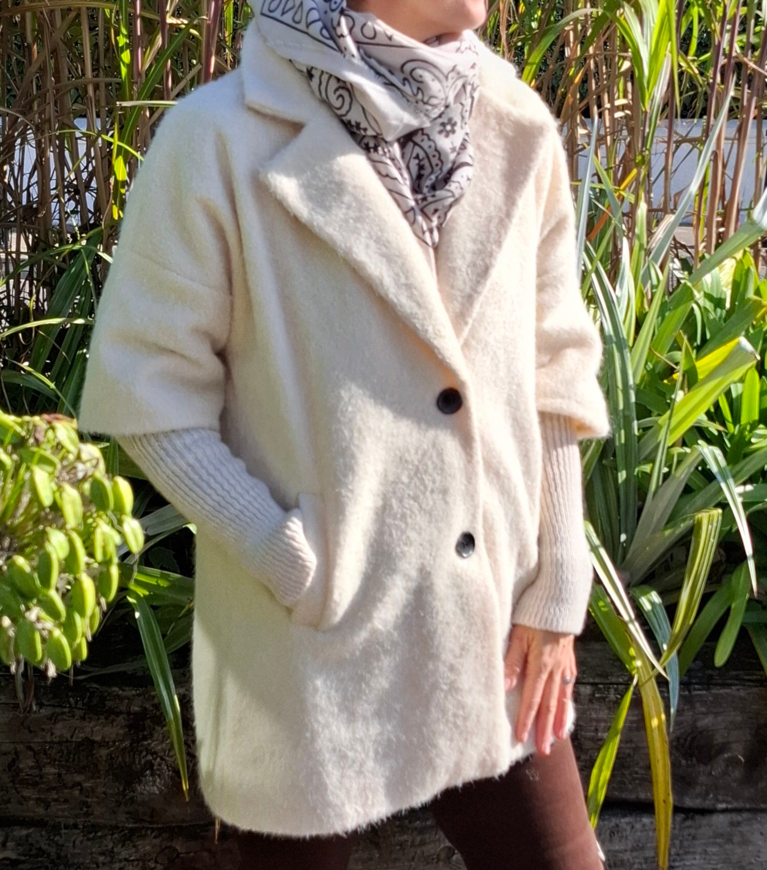 Cosy coat with ribbed sleeve