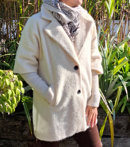 Cosy coat with ribbed sleeve