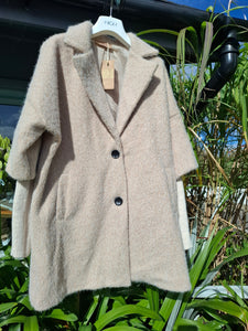 Cosy coat with ribbed sleeve