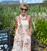 Load image into Gallery viewer, Smocked floral tiered midi dress
