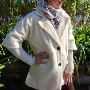 Cosy coat with ribbed sleeve