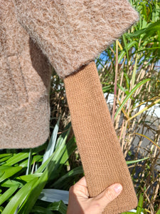 Cosy coat with ribbed sleeve