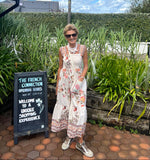 Load image into Gallery viewer, Smocked floral tiered midi dress
