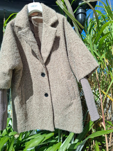 Cosy coat with ribbed sleeve