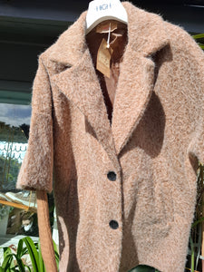 Cosy coat with ribbed sleeve