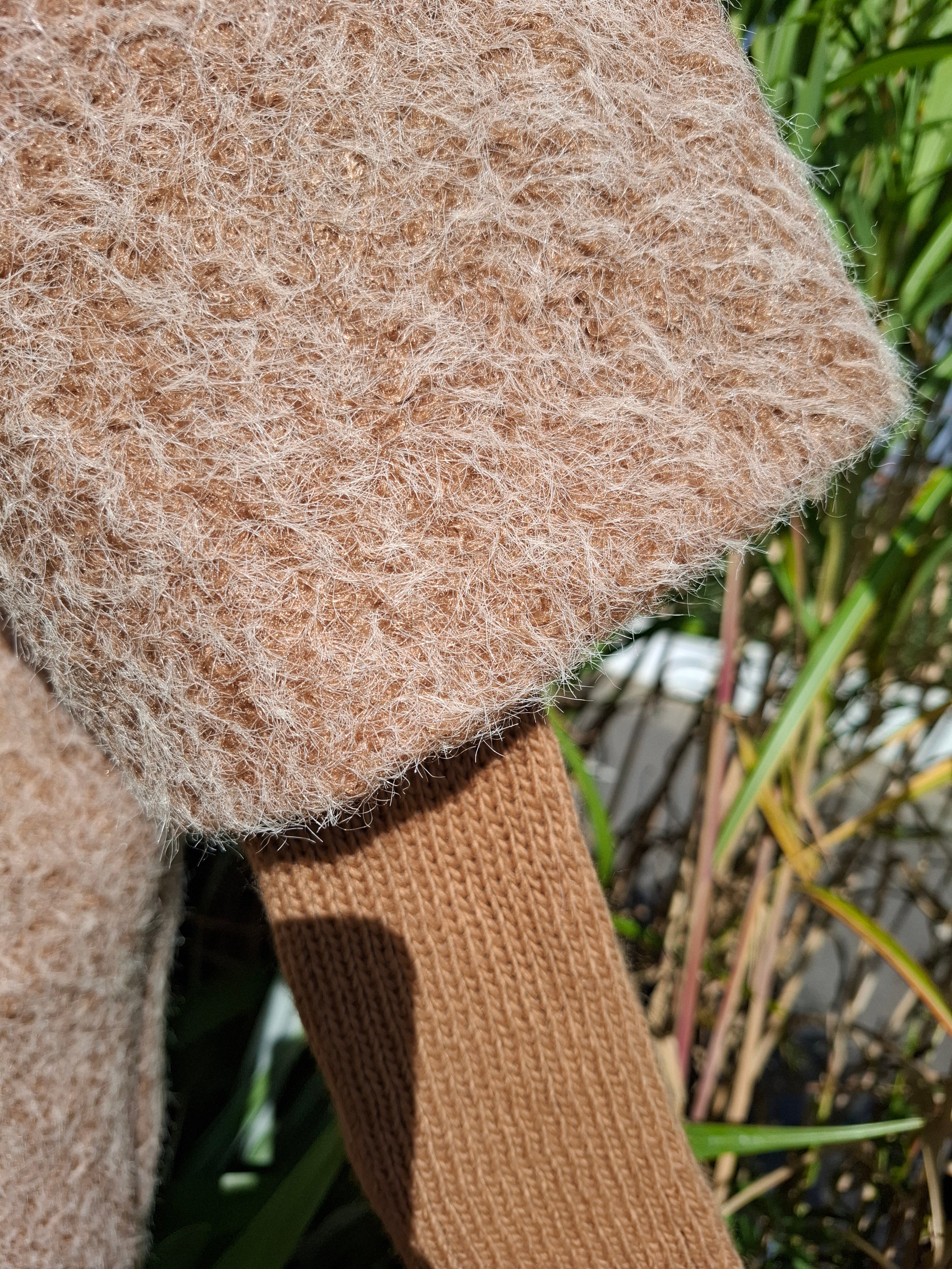 Cosy coat with ribbed sleeve
