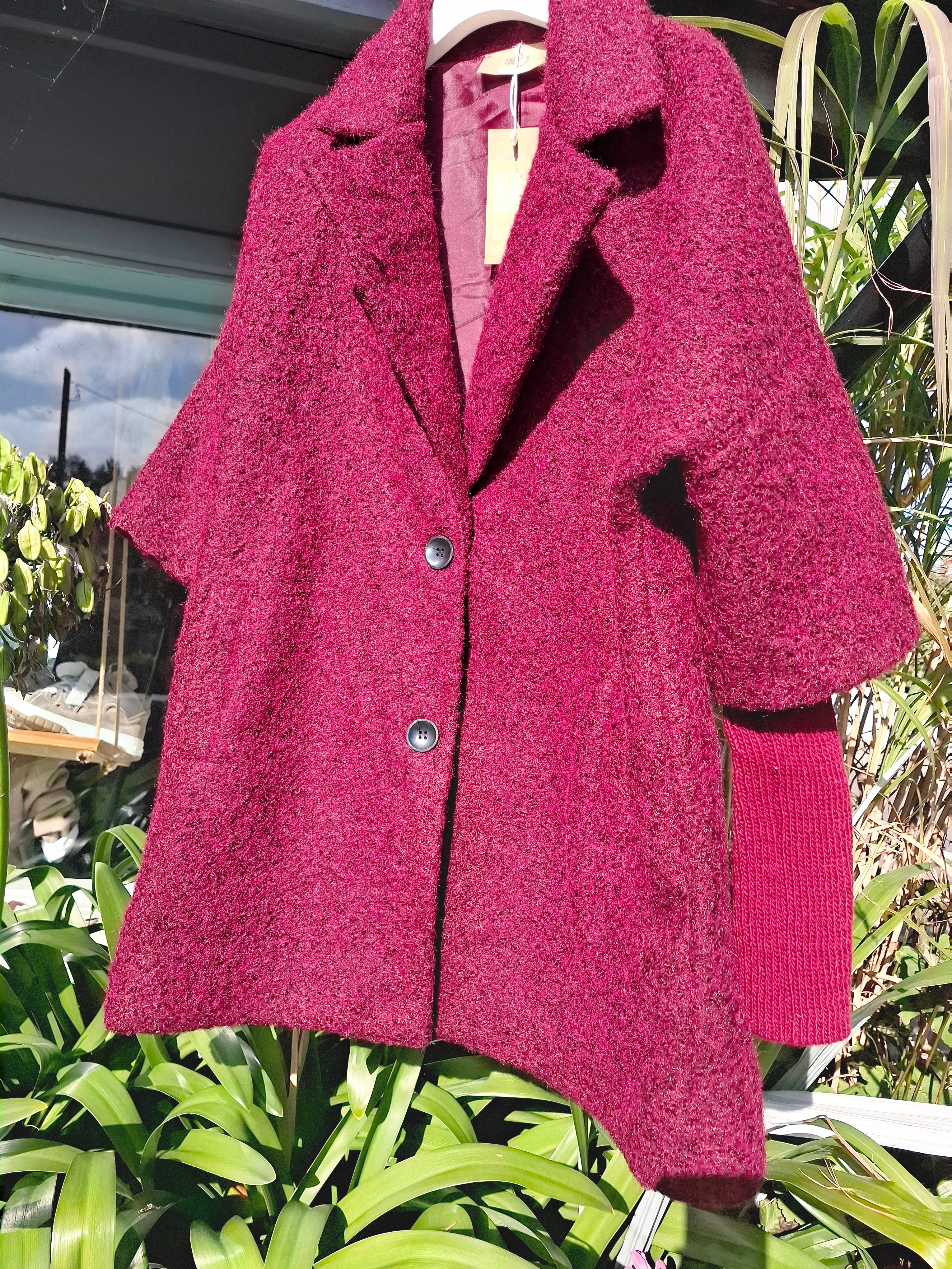 Cosy coat with ribbed sleeve