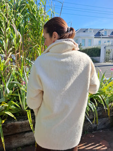 Cosy coat with ribbed sleeve