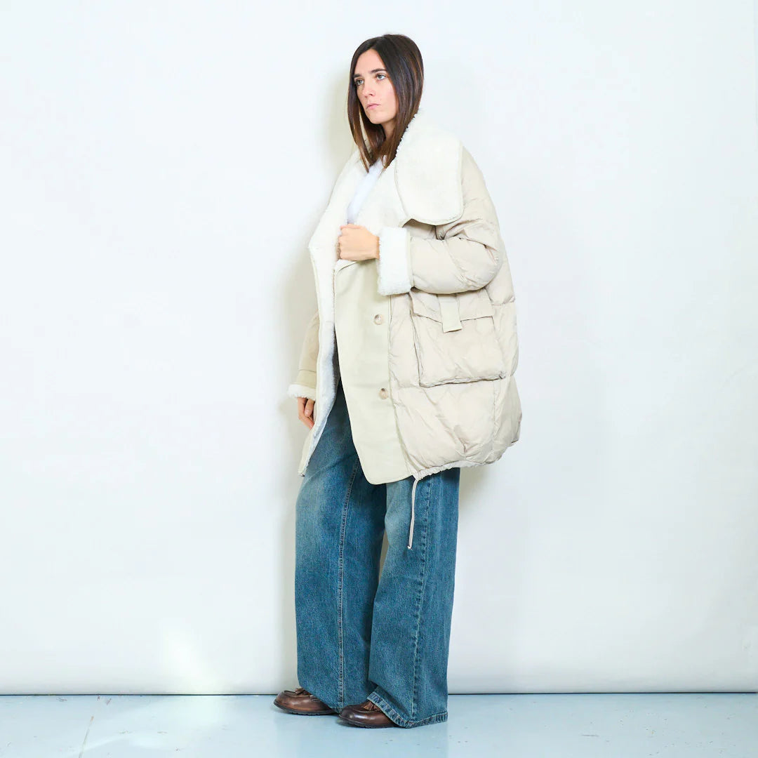 Oversized duck down double-breasted coat with faux shearling collar