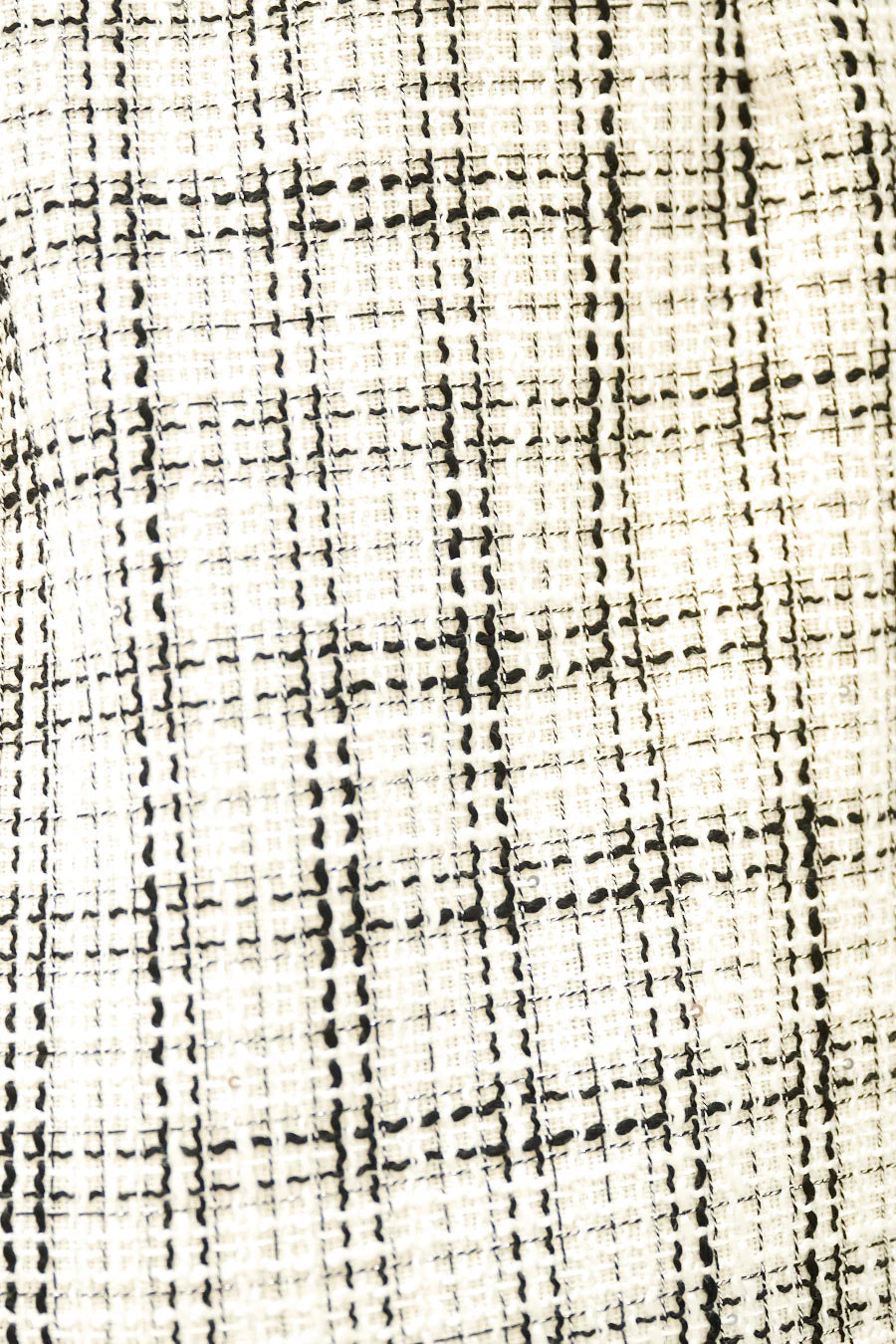 Luxury tweed sleeveless vest.