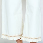 Load image into Gallery viewer, Cream denim relaxed tapered jeans

