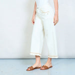 Load image into Gallery viewer, Cream denim relaxed tapered jeans
