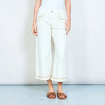 Load image into Gallery viewer, Cream denim relaxed tapered jeans
